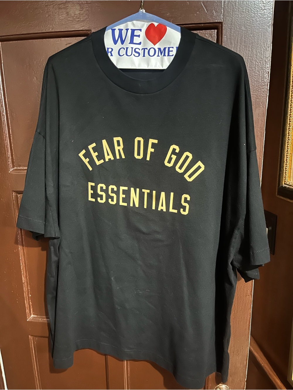 Essentials Men’s Black Short-Sleeve Tee with Gold Print